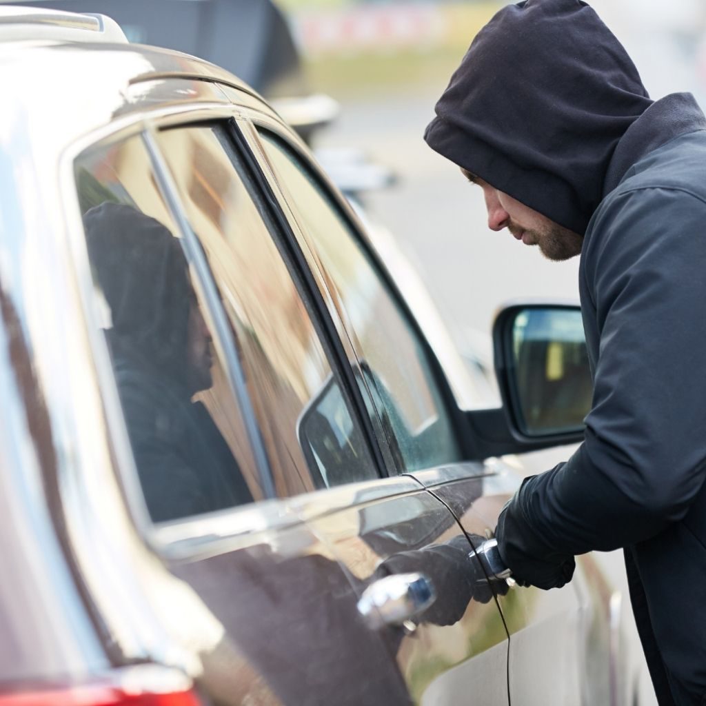Thief Stealing Vehicle With A Car GPS Tracker