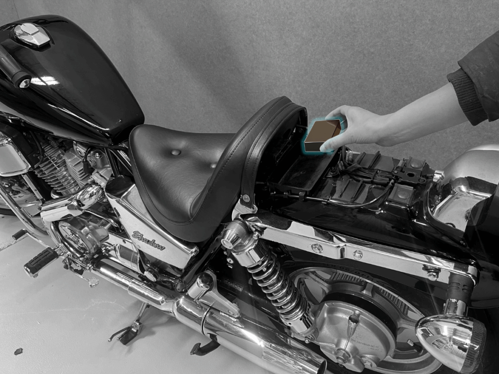 Hiding a Solid GPS Tracker on a motorcycle/motorbike backseat