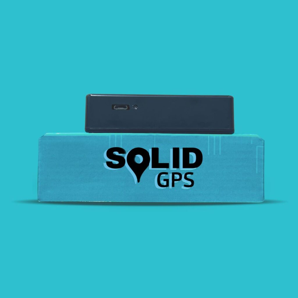 A GPS tracker placed on top of a Solid GPS box